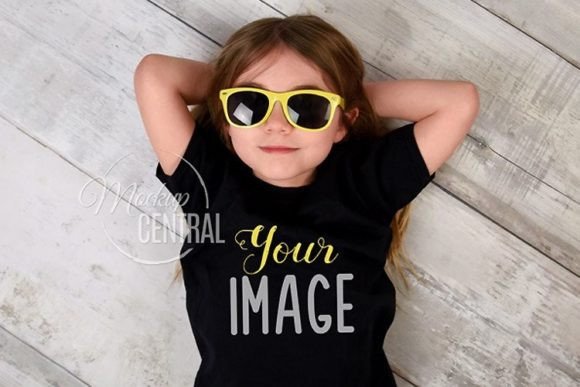 Child Wearing Black T-Shirt Mockup